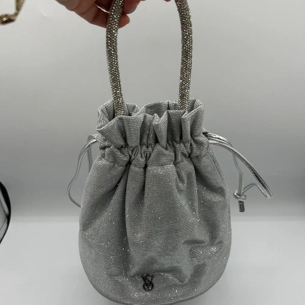 Victoria's Secret Silver glittery drawstring bag with rhinestone handle